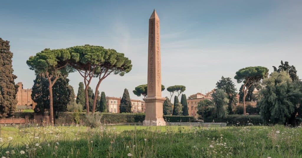 An ancient Egyptian obelisk, a monumental structure of 80 feet representing power and history.