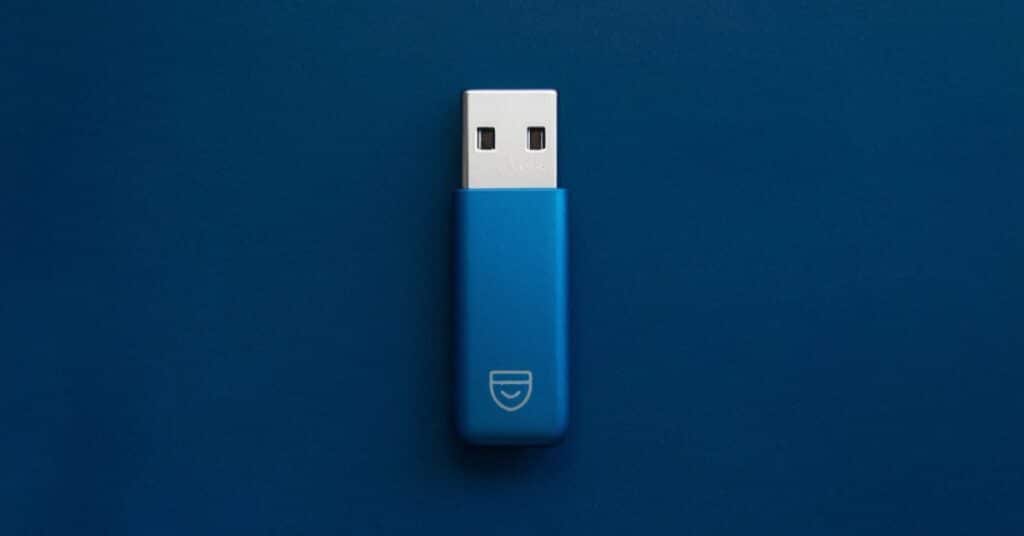 a small two inches usb is displayed with blue background.