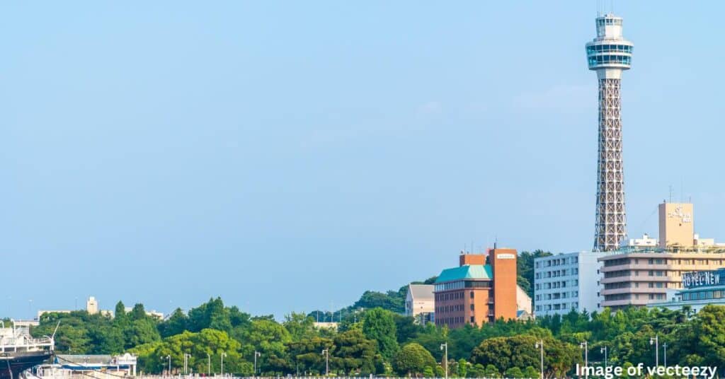 An image of Yokohama Marine Tower in Japan. The sky is clear and the image is from vecteezy.