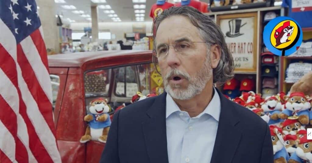 An image of Arch Aplin while giving interview. He is standing in Buc-ee's.