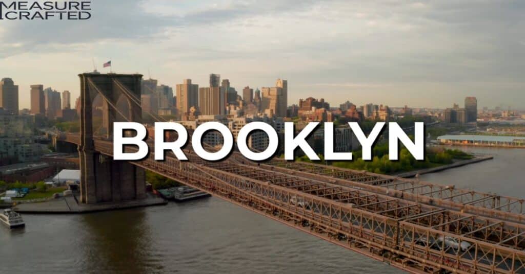 Ariel view of Brooklyn Bridge. The word "Brooklyn" is written on the picture.