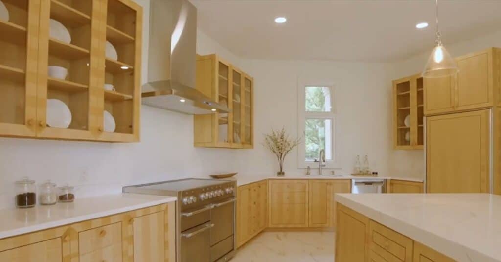 A picture of the kitchen in Mike Tyson mansion. It has woodwork done on all the cabinents and drawers etc.